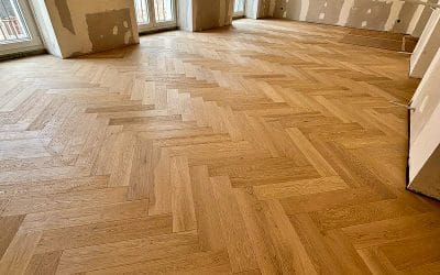 Proyecto en Calle Alcalá: Tarima Multicapa de roble en Espiga Invisible sin faja